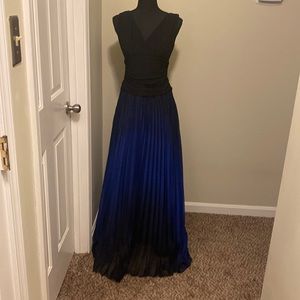 Formal gown, floor length, semi stretchy at the top